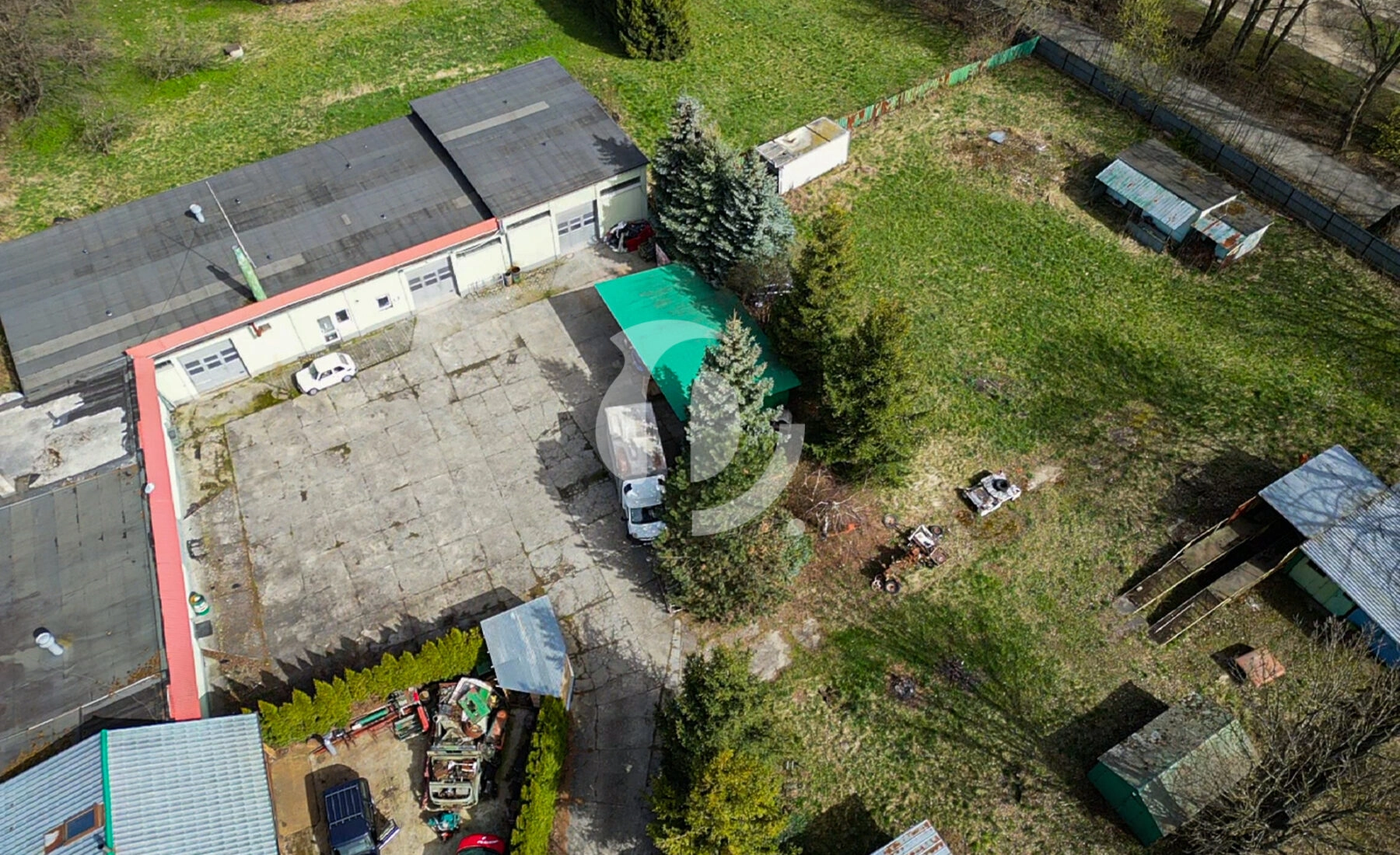 Działka zabudowana budynkiem warsztatowo-socjalnym