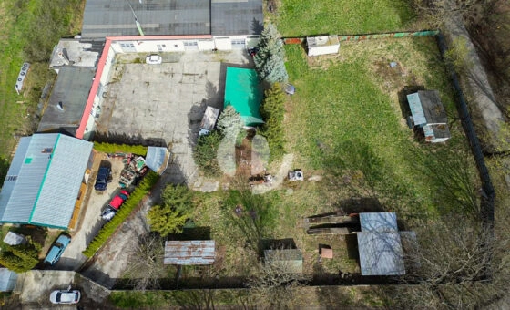 Działka zabudowana budynkiem warsztatowo-socjalnym