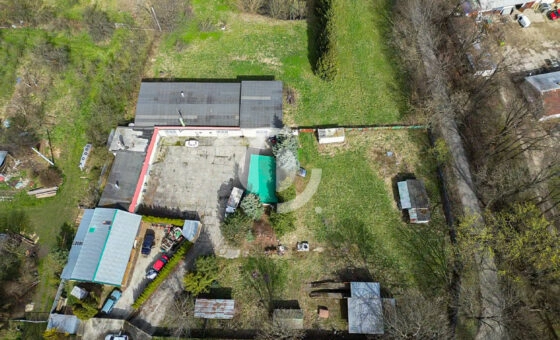 Działka zabudowana budynkiem warsztatowo-socjalnym