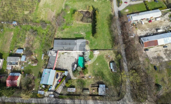 Działka zabudowana budynkiem warsztatowo-socjalnym