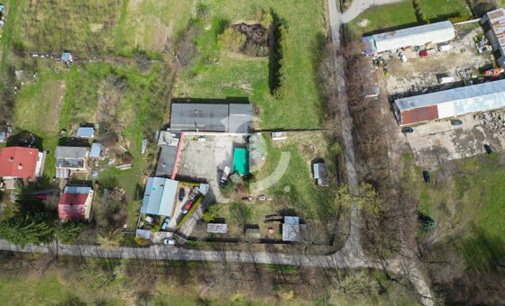 Działka zabudowana budynkiem warsztatowo-socjalnym